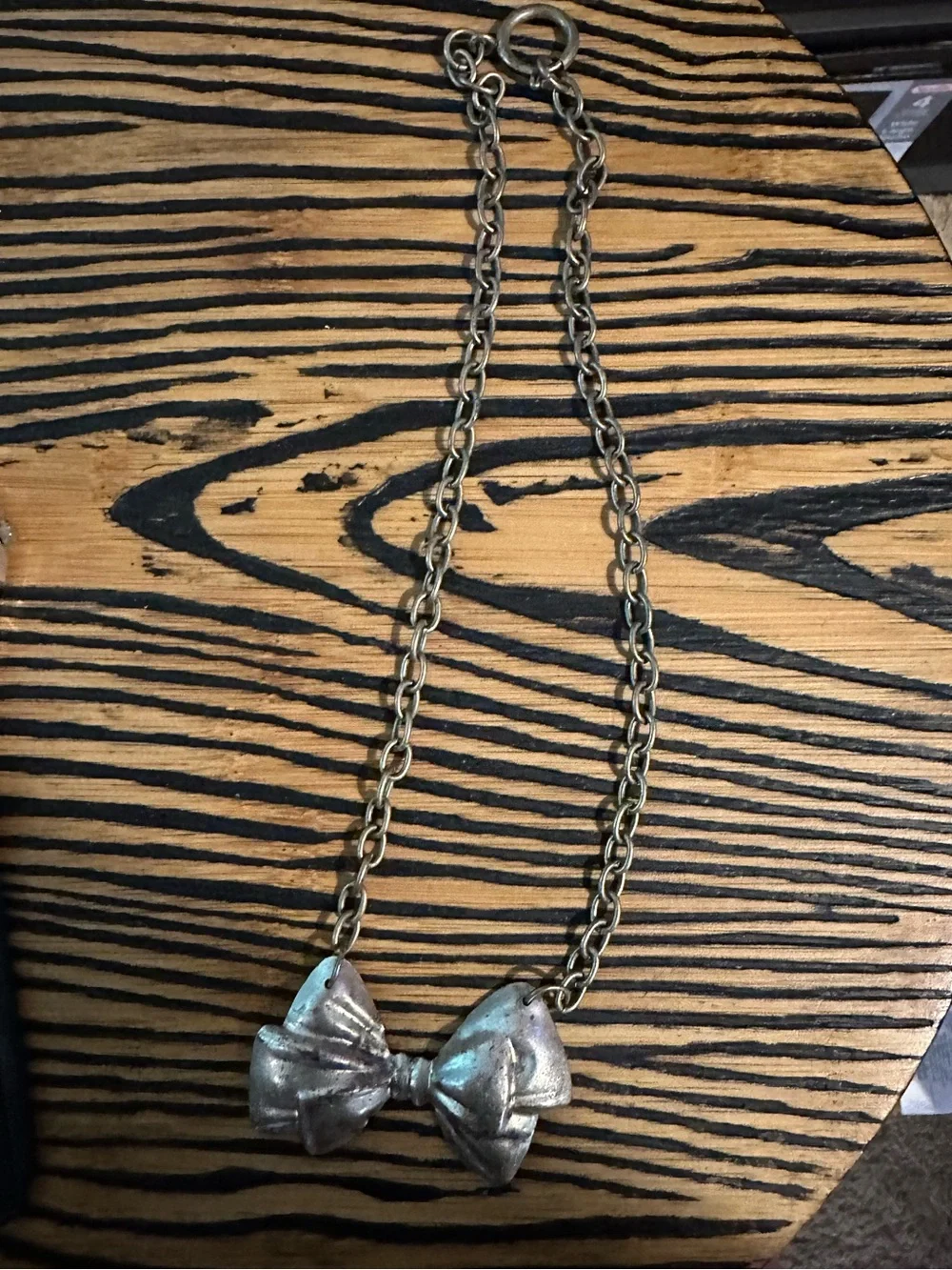 Bow Pendant Necklace - Metallic Silver Tone